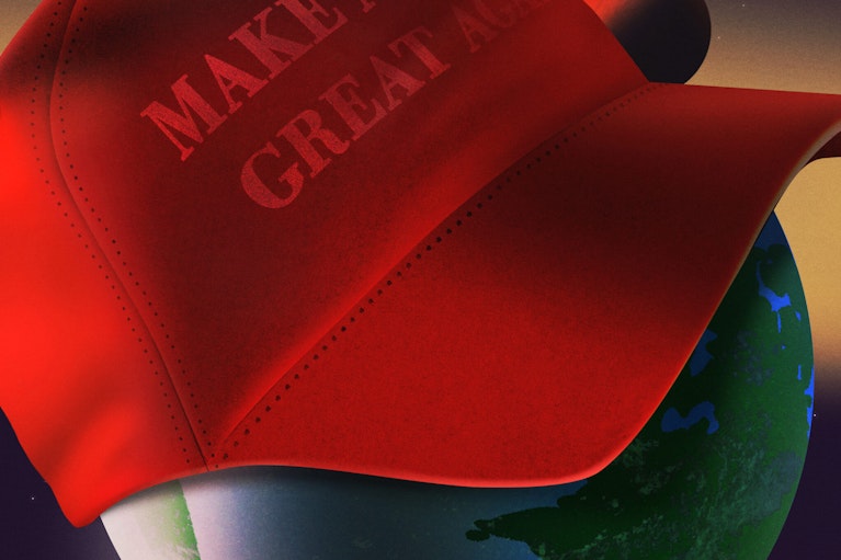 Image of large Trump "Make America Great Again" ballcap over a globe by Ibrahim Rayintakath for Noema Magazine.
